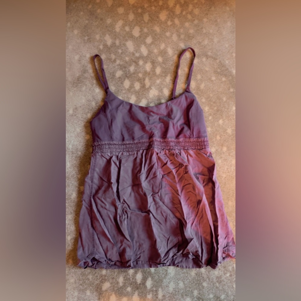 I’m selling a Lululemon tank-top! It comes with a built in bra and it’s purple!